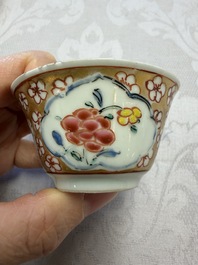 Six Chinese famille rose gilt-decorated 'Flower Basket' cups and saucers, Yongzheng/Qianlong