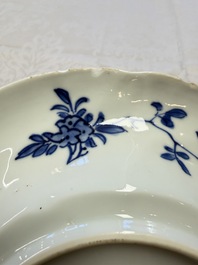 Eleven Chinese blue and white gadrooned 'Flowers and Peacocks' plates, Kangxi