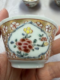 Six Chinese famille rose gilt-decorated 'Flower Basket' cups and saucers, Yongzheng/Qianlong