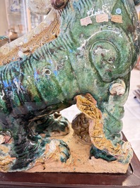 A pair of large Chinese polychrome-glazed Shiwan stoneware Buddhist lions, 19th C.