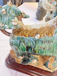 A pair of large Chinese polychrome-glazed Shiwan stoneware Buddhist lions, 19th C.