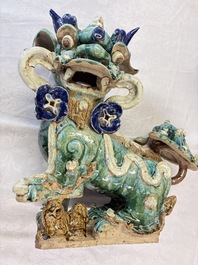 A pair of large Chinese polychrome-glazed Shiwan stoneware Buddhist lions, 19th C.