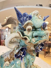 A pair of large Chinese polychrome-glazed Shiwan stoneware Buddhist lions, 19th C.