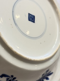 Eleven Chinese blue and white gadrooned 'Flowers and Peacocks' plates, Kangxi