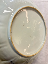 A pair of Chinese blue and white moulded dishes with dancing ladies, Kangxi