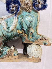 A pair of large Chinese polychrome-glazed Shiwan stoneware Buddhist lions, 19th C.