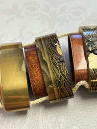 A fine Japanese four-case metal-inlaid lacquer 'Kanshin' inrō by Kōzan with a red coral ojime and a 'Jurojin' netsuke, Kōzan 光山 mark, Edo