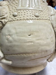 A Chinese Nanking white-glazed 'hu' vase with figural relief design, 19th C.