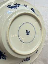 Eleven Chinese blue and white gadrooned 'Flowers and Peacocks' plates, Kangxi