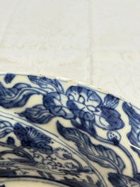 Eleven Chinese blue and white gadrooned 'Flowers and Peacocks' plates, Kangxi