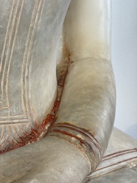 A monumental Burmese white marble Post-Pagan Buddha with traces of gilt-lacquer, Ava Kingdom, 17th C