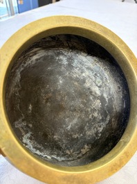 A fine Chinese bronze censer with loop handles and stand, Xuande mark, 18th C.