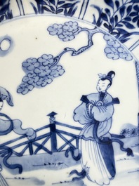 A pair of Chinese blue and white moulded dishes with dancing ladies, Kangxi