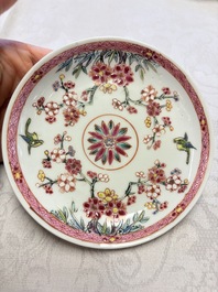 Three Chinese famille rose 'Birds and Plum Trees' cups and saucers, Yongzheng