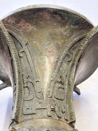 A Chinese archaic bronze wine vessel with Taotie design, Zun 尊, late Shang