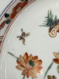 Three Chinese famille verte plates with floral design, one powder-blue-ground, Kangxi