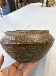 A Chinese archaic bronze serving vessel and cover, Eastern Zhou/Spring and Autumn