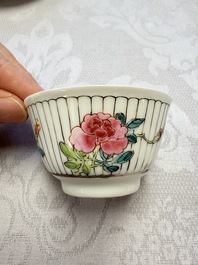 A Chinese famille rose cup and saucer with floral design, Yongzheng