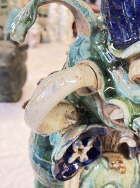 A pair of large Chinese polychrome-glazed Shiwan stoneware Buddhist lions, 19th C.