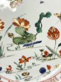 Three Chinese famille verte plates with floral design, one powder-blue-ground, Kangxi