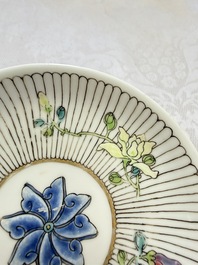 A Chinese famille rose cup and saucer with floral design, Yongzheng