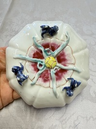 A rare Chinese famille rose moulded cup and saucer with floral design, Yongzheng