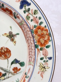 Three Chinese famille verte plates with floral design, one powder-blue-ground, Kangxi