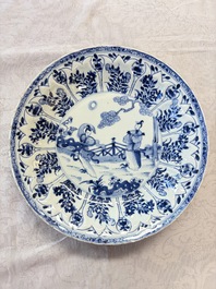 A pair of Chinese blue and white moulded dishes with dancing ladies, Kangxi