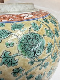 A rare pair of Chinese famille verte yellow-ground 'Flower Scroll' covered vases, Kangxi