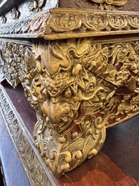 An exceptional Vietnamese gilt-lacquered wood and ivory 'Dragon and Phoenix' throne-shaped altar, 18/19th C.
