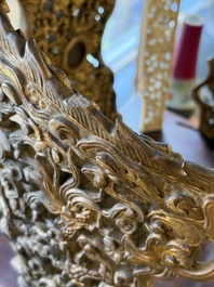 An exceptional Vietnamese gilt-lacquered wood and ivory 'Dragon and Phoenix' throne-shaped altar, 18/19th C.