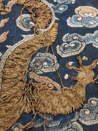 A Chinese silk blue-ground summer gauze 'Dragons' robe, 19th C.