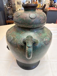 A large Chinese archaistic bronze wine vessel and cover with ram-form handles, Lei 罍, Ming