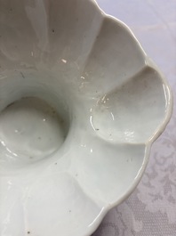 A very large Chinese Dehua blanc de Chine libation cup with a dragon, a qilin, a tiger and a crane, 18th C.