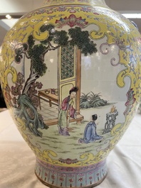A pair of large Chinese famille rose yellow-ground 'Hu' vases with narrative design, Qianlong mark, Republic