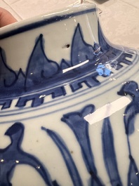 Two Chinese blue and white 'Lotus Scroll' vases and covers, Kangxi