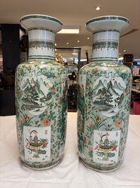 An impressive and fine pair of large Chinese famille verte 'Fishermen and Antiquities' rouleau vases, seal marks, Kangxi