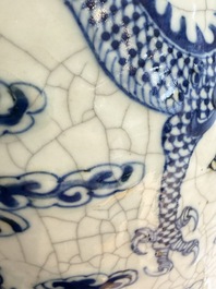 A pair of Chinese blue and white Nanking crackle-glazed 'Dragons' vases, 19th C.