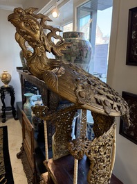 An exceptional Vietnamese gilt-lacquered wood and ivory 'Dragon and Phoenix' throne-shaped altar, 18/19th C.