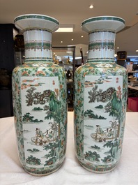 An impressive and fine pair of large Chinese famille verte 'Fishermen and Antiquities' rouleau vases, seal marks, Kangxi