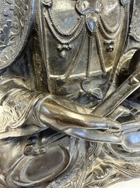 A fine Chinese bronze figure of Bodhisattva holding a ruyi, Ming