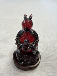 A rare complete set of 12 Chinese cherry amber 'Zodiac' figures on wooden stands, Qianlong mark, Republic