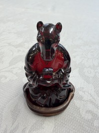 A rare complete set of 12 Chinese cherry amber 'Zodiac' figures on wooden stands, Qianlong mark, Republic