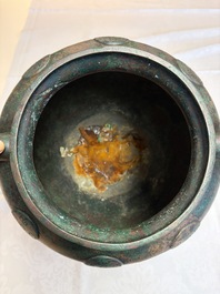 A large Chinese archaistic bronze wine vessel and cover with ram-form handles, Lei 罍, Ming