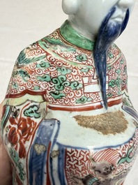 A rare Chinese wucai figure of a dignitary, late Ming/Transitional period