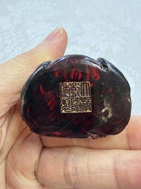 A rare complete set of 12 Chinese cherry amber 'Zodiac' figures on wooden stands, Qianlong mark, Republic