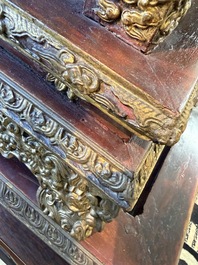 An exceptional Vietnamese gilt-lacquered wood and ivory 'Dragon and Phoenix' throne-shaped altar, 18/19th C.