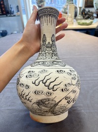 A Chinese black-enamelled biscuit 'Dragon' vase, Kangxi mark, 19th C.