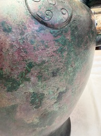 A large Chinese archaistic bronze wine vessel and cover with ram-form handles, Lei 罍, Ming