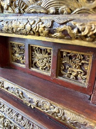 An exceptional Vietnamese gilt-lacquered wood and ivory 'Dragon and Phoenix' throne-shaped altar, 18/19th C.